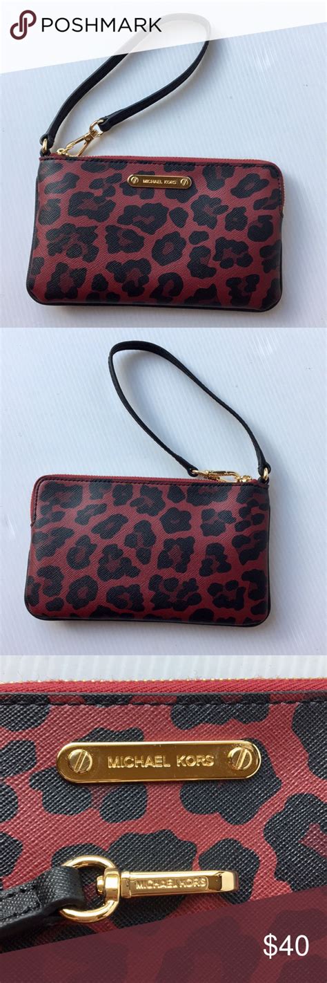 michael kors large animal print wristlet|Michael Kors clutch.